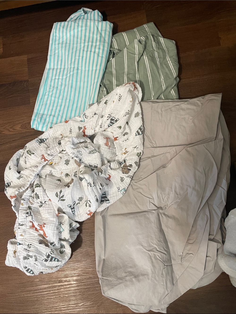 Neutral Taupe Sheet Set with Woodland Print Muslin Swaddle and Striped Linens